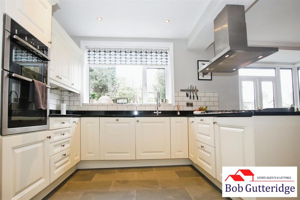 Open plan fitted kitchen/dining room