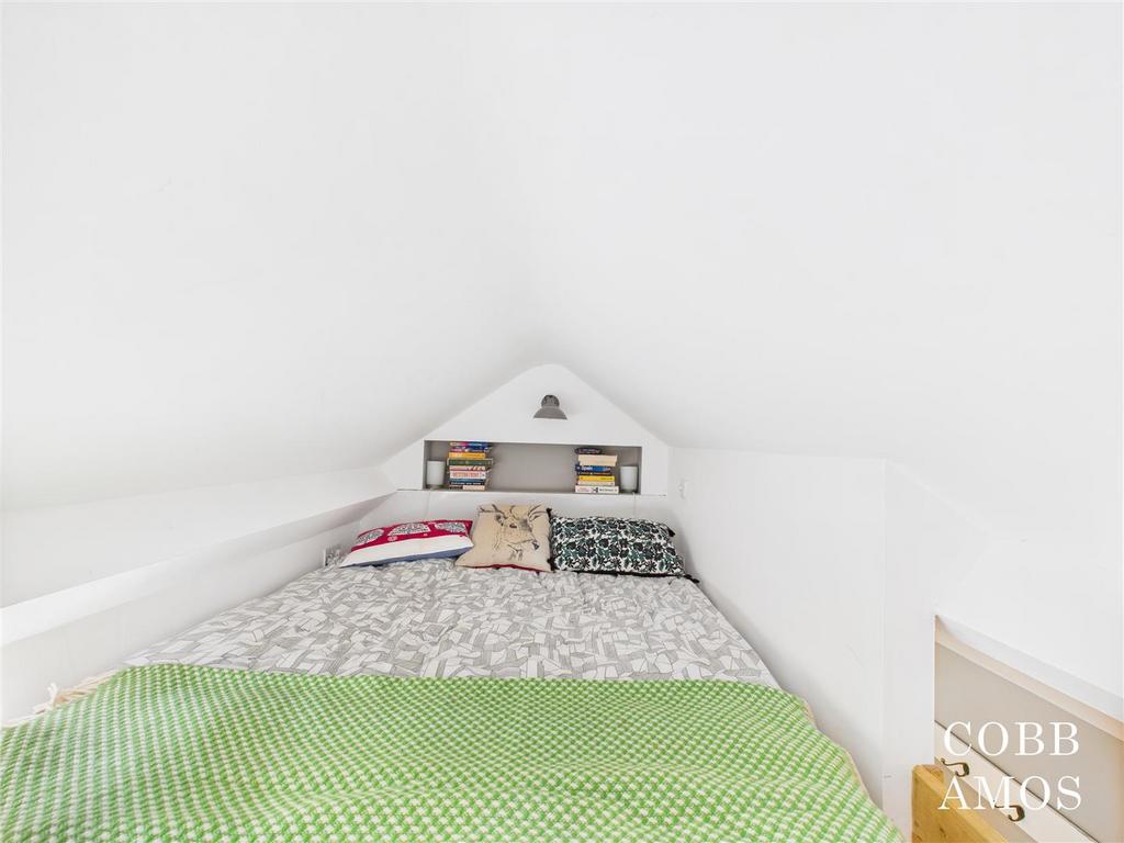 CAM02803 G0-PR0220-STILL012 bed by spiral staircase