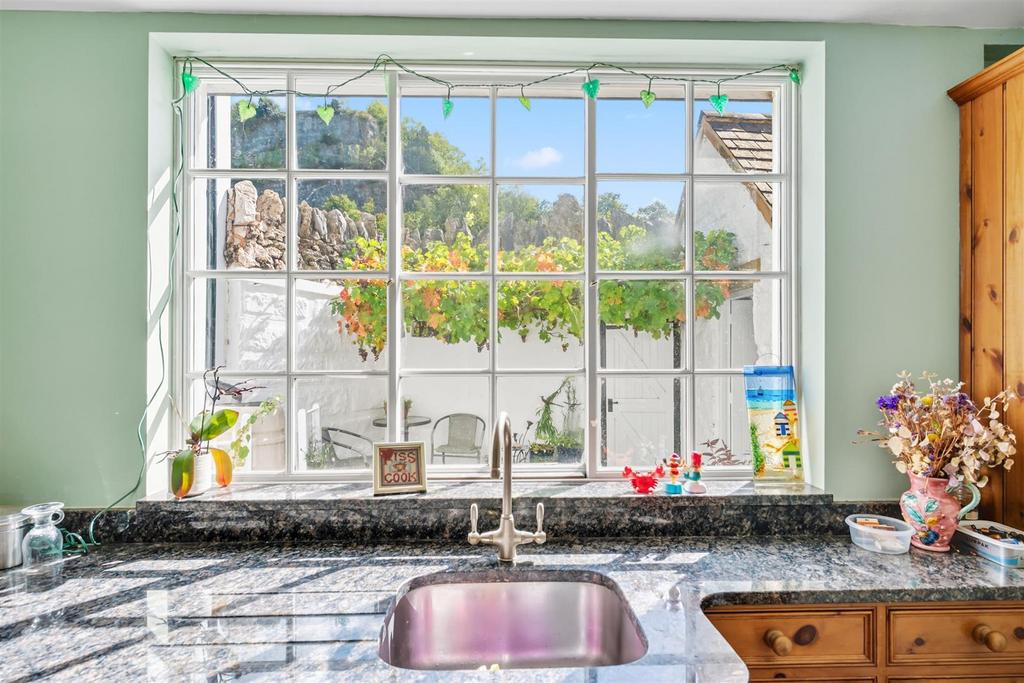 Kitchen window to courtyard garden.jpg