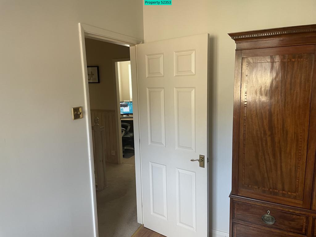 Exiting the third bedroom