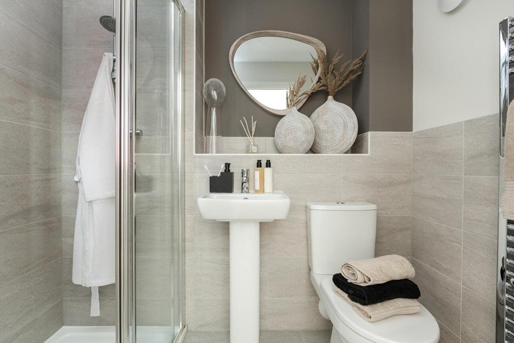 The main bedroom has its own en-suite shower room