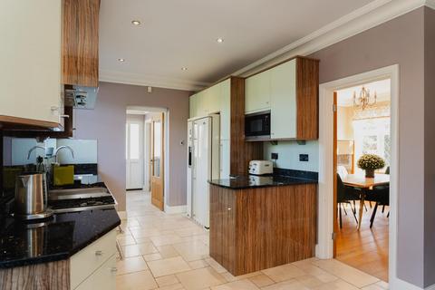1 Forest Crescent, Ashtead, KT21 1JU