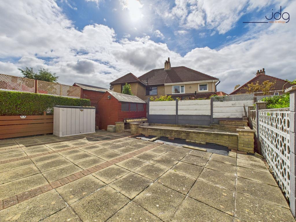 Spacious Flagged Garden to the rear of the...