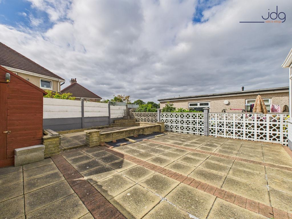 Spacious Flagged Garden to the rear of the...