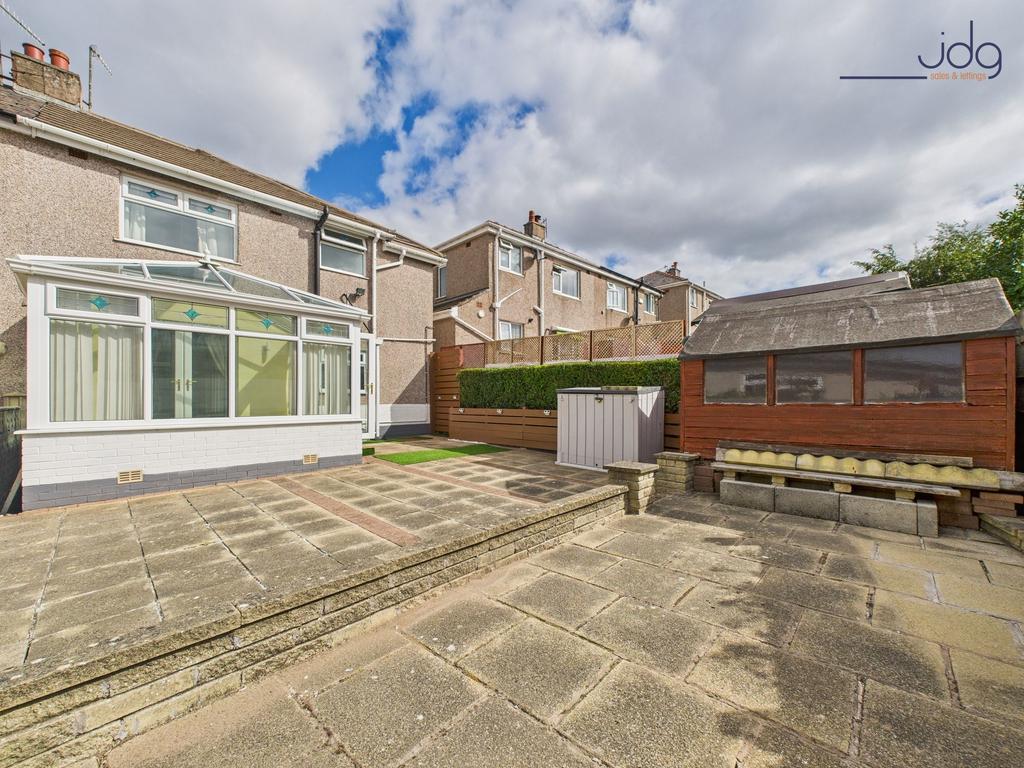 Spacious Flagged Garden to the rear of the...