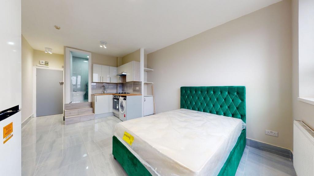 Bright and modern living space featuring a plus...