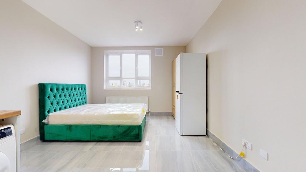 Bright and modern single bedroom featuring a vi...