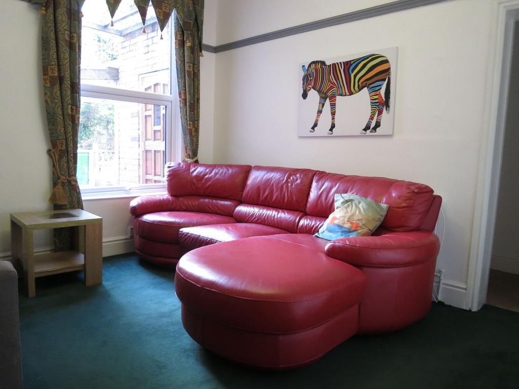 Bright and welcoming living room featuring a la...