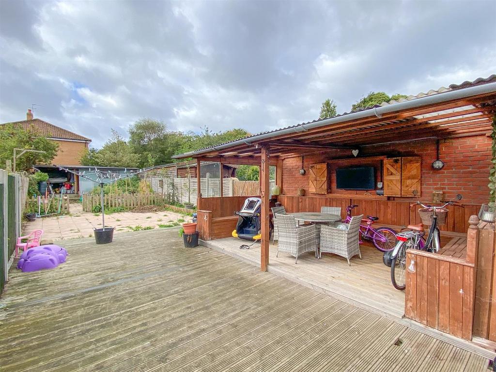 Outside covered space and rear garden.jpg