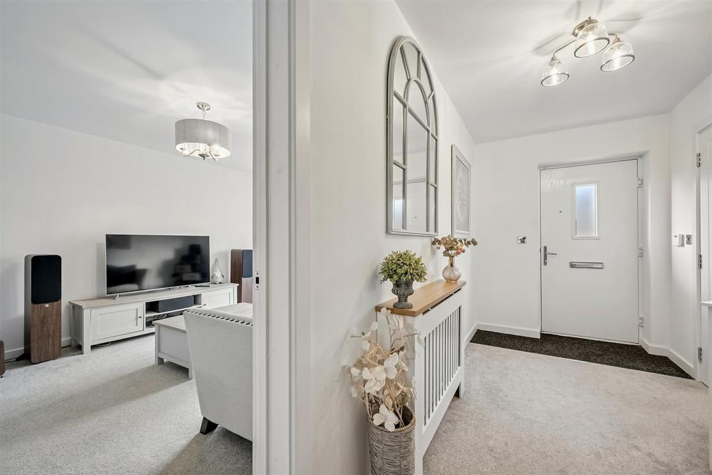 Entrance Hallway and Sitting Room.jpg