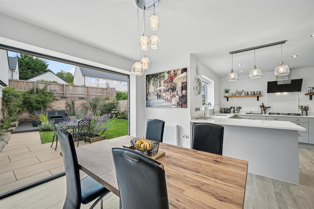 Dining Area to Kitchen and rear garden.jpg