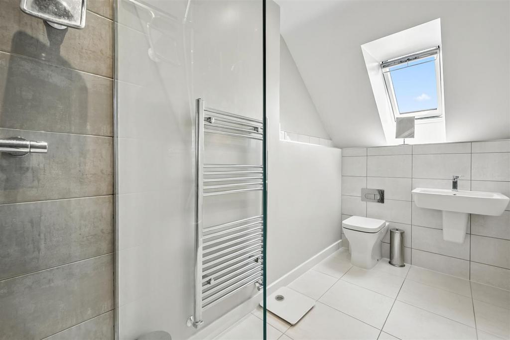 Bedroom Five en-suite - sink and WC.jpg