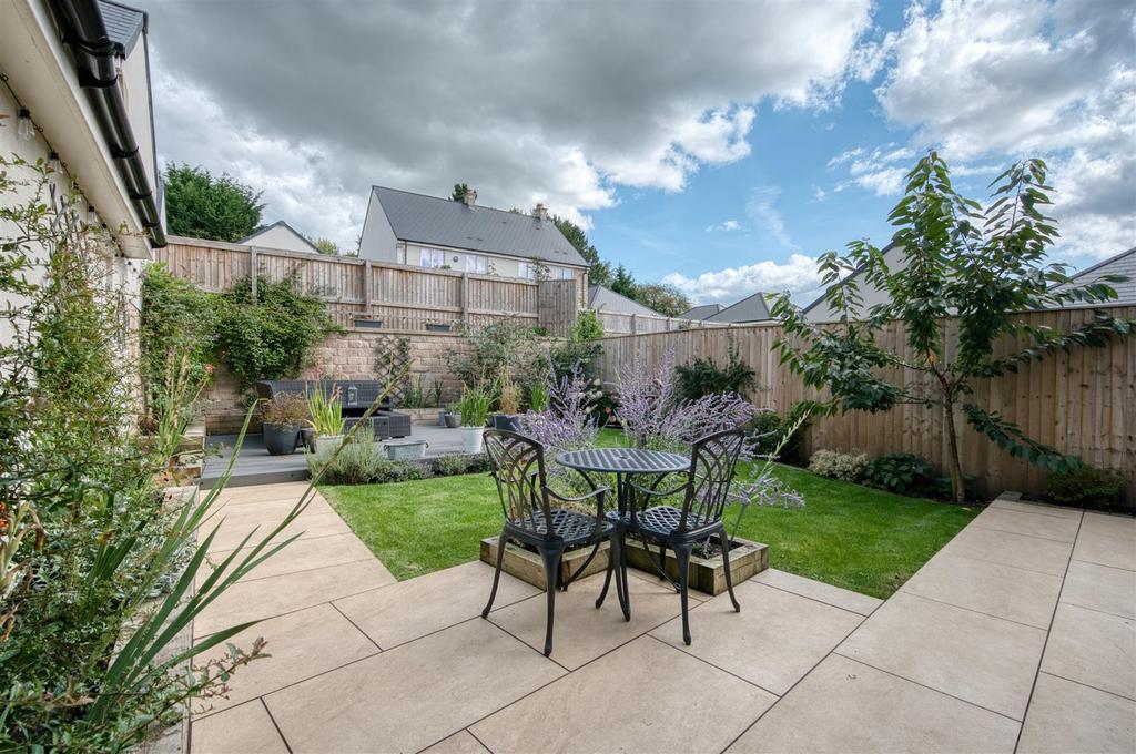 Rear Garden - dining patio and seating.jpg