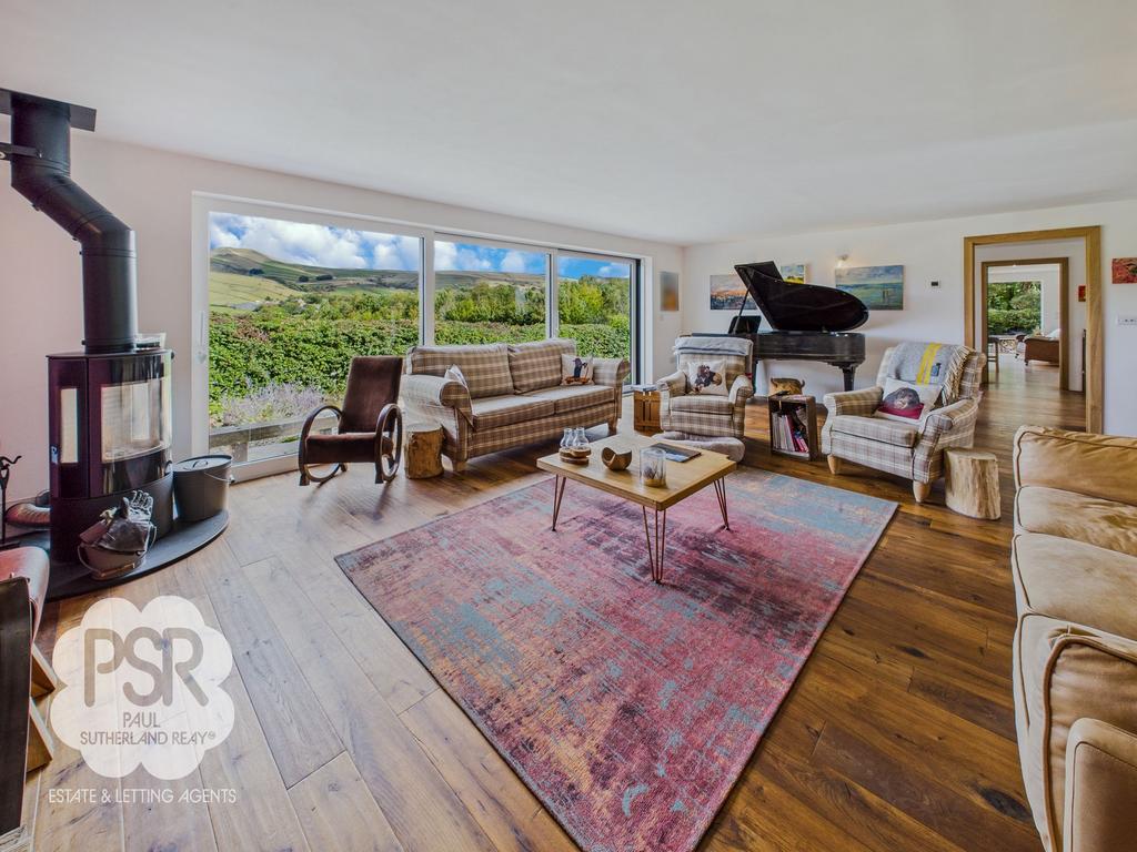 Snug Lounge with Stunning Views and Log Burner