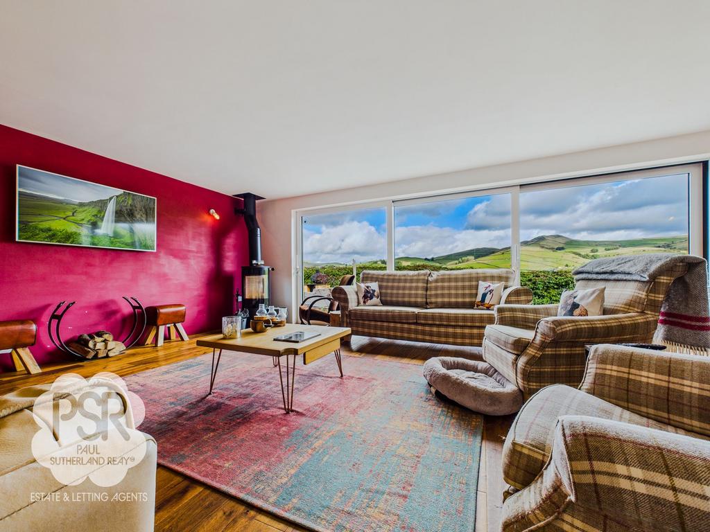 Snug Lounge with Stunning Views and Log Burner