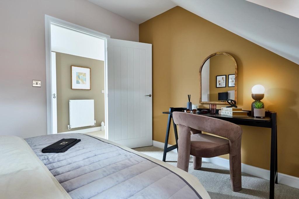 The fourth bedroom found on the top floor is...
