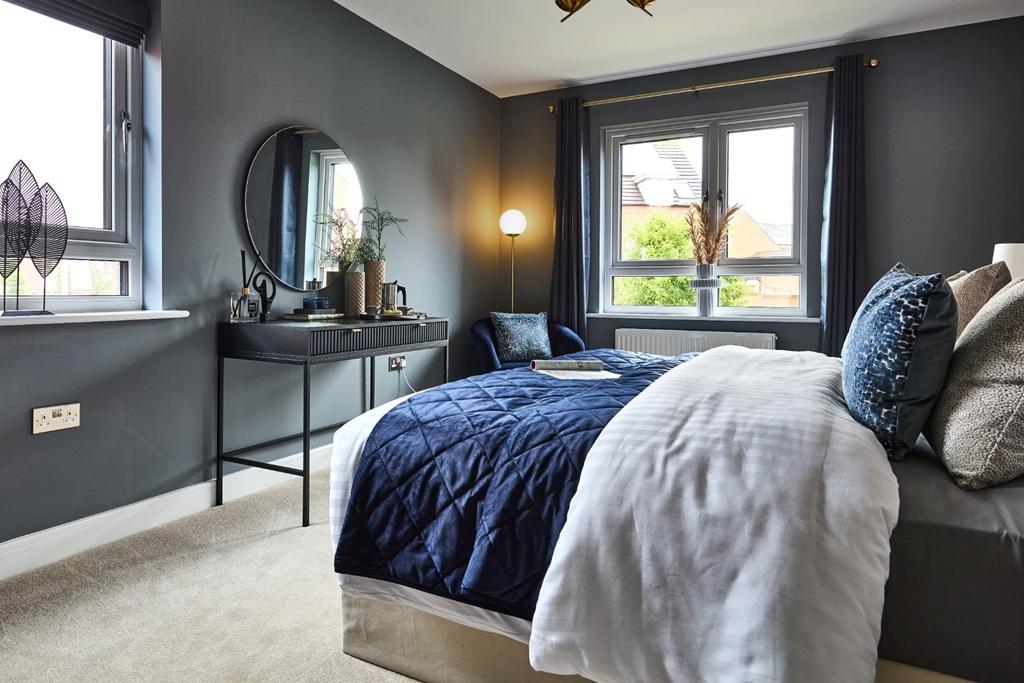 The main bedroom offers a sense of luxury with...
