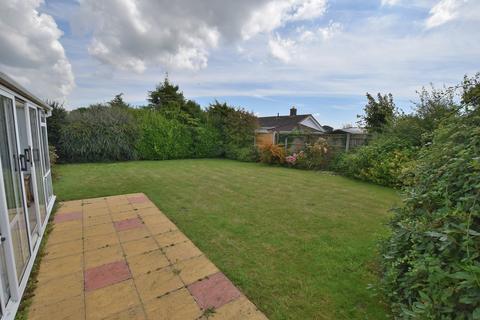 2 bedroom detached bungalow for sale, Chiltern Drive, Barton On Sea, New Milton, Hampshire. BH25 7LD