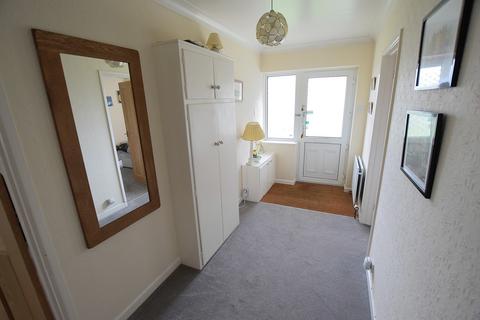 2 bedroom detached bungalow for sale, Chiltern Drive, Barton On Sea, New Milton, Hampshire. BH25 7LD