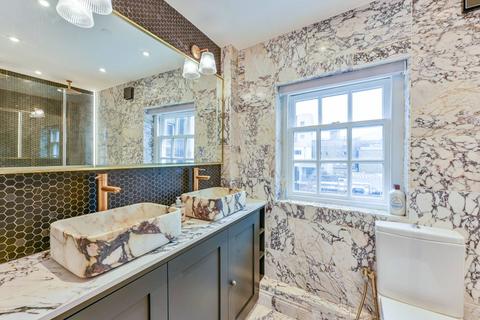 undefined, Colville Place, Fitzrovia, London, W1T