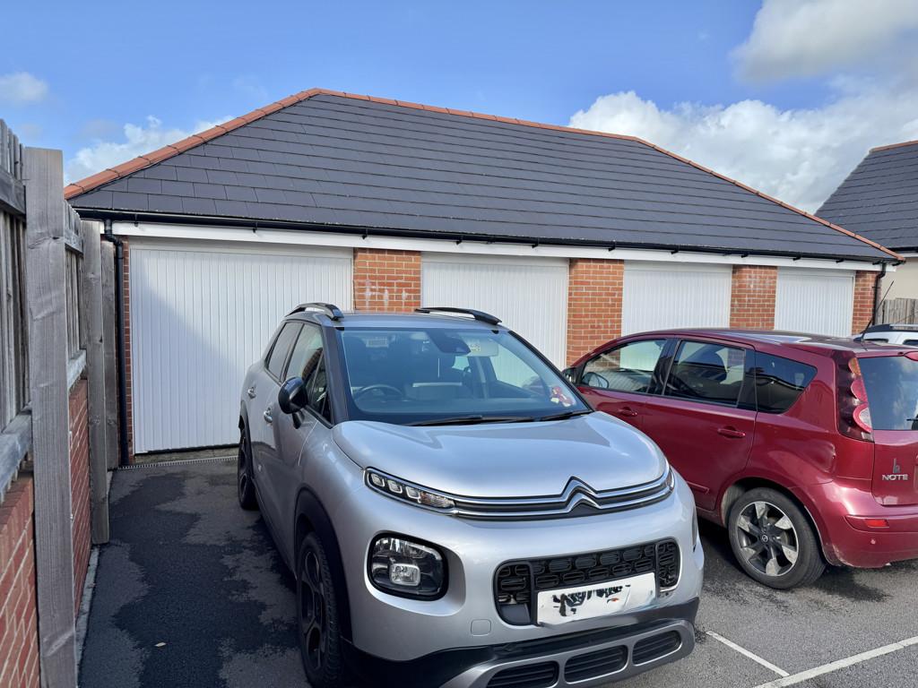 Garage + Parking Space