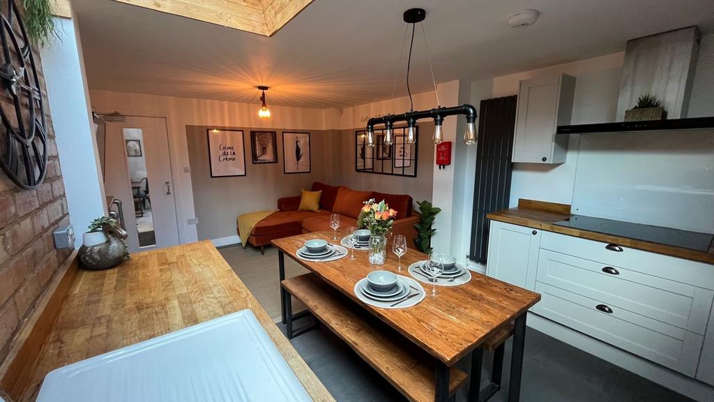 A modern and inviting living room with a comfor...