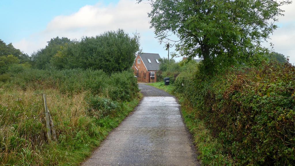 The driveway serves several detached properties.