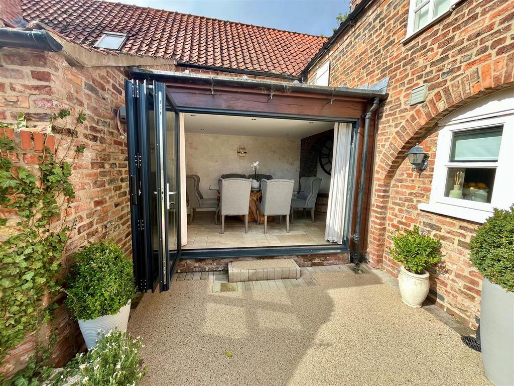 Dining Area - Bi Folding Doors to Inside.jpg