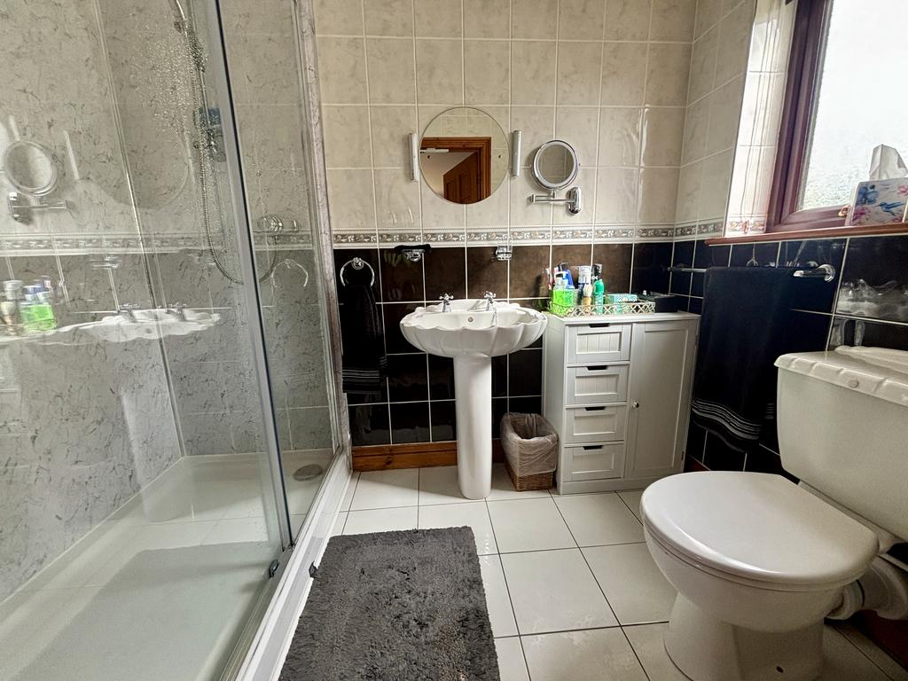 En suite shower room to bedroom 1