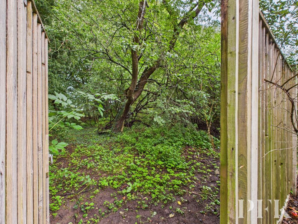 Gate from rear garden to additional woodland area