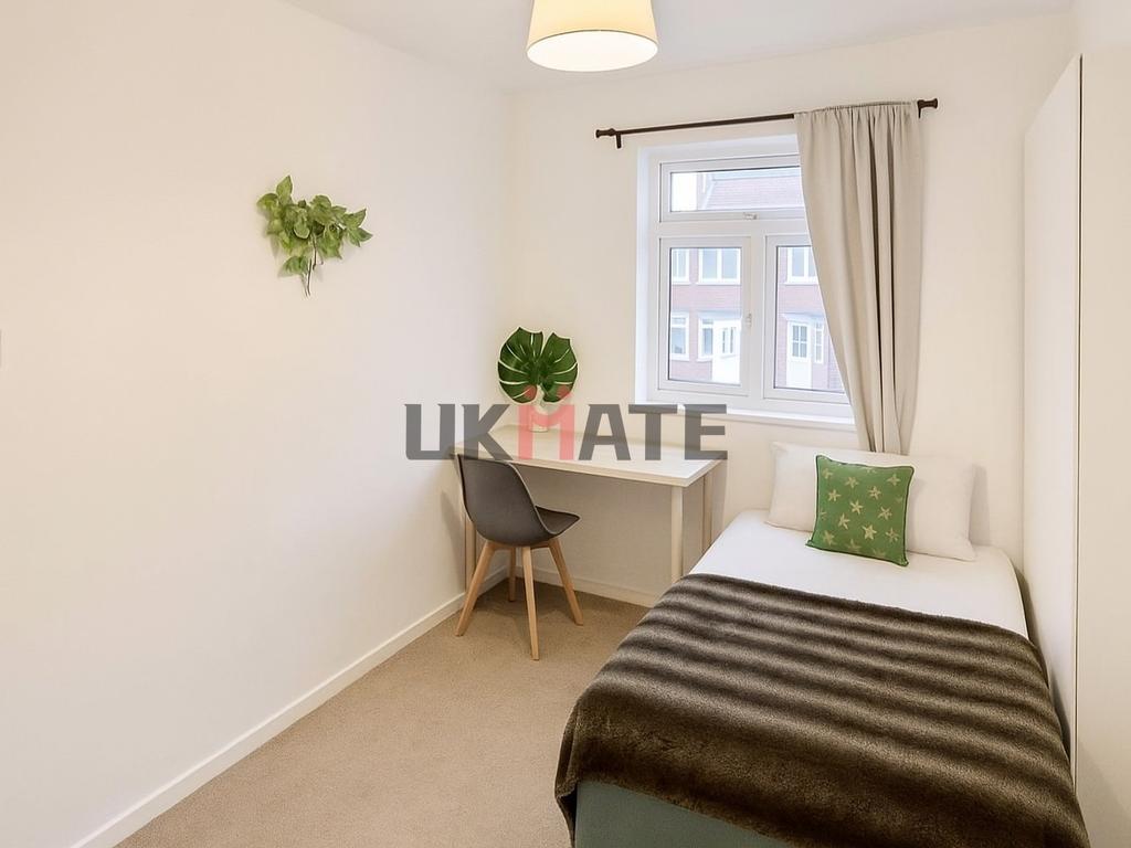 Bright and inviting master bedroom featuring a ...