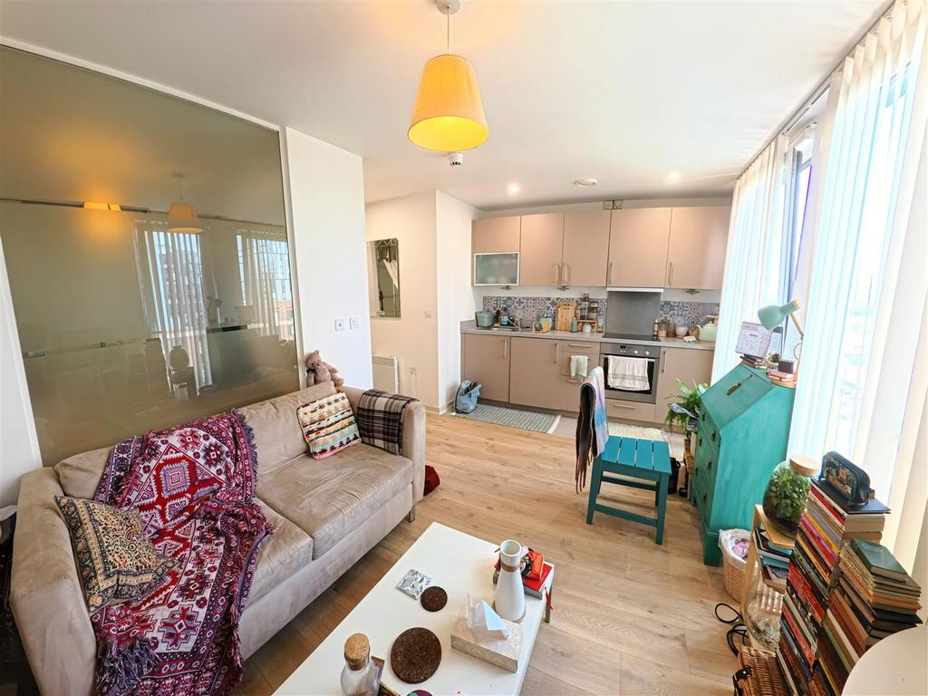 Living room with kitchen.JPG