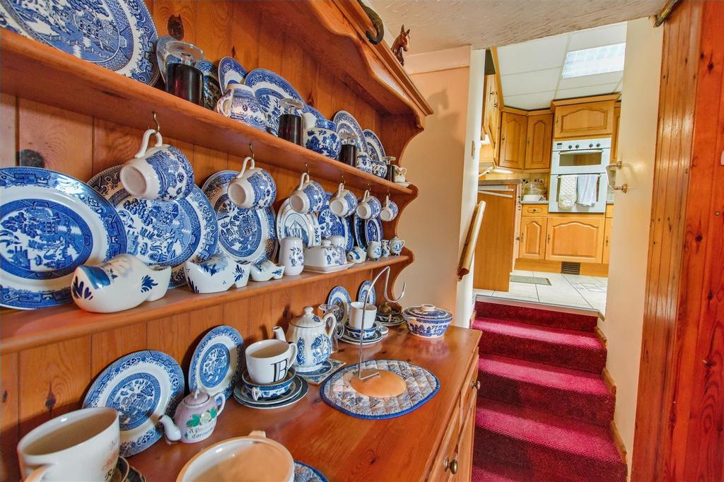 Living Room and steps to kitchen