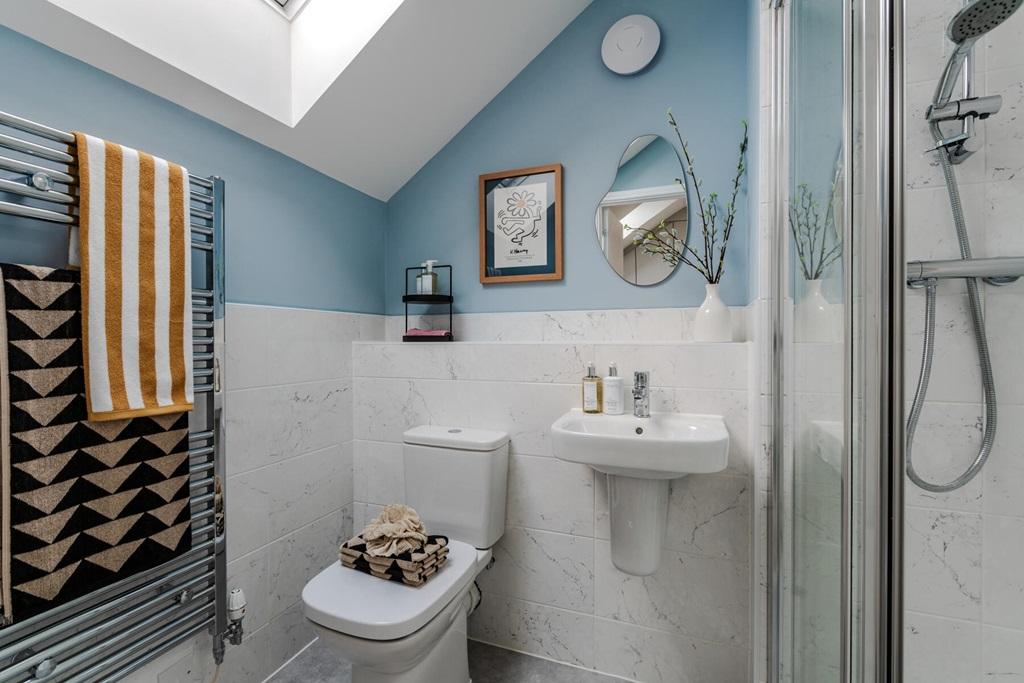Bedroom 1 also benefits from a private en-suite...