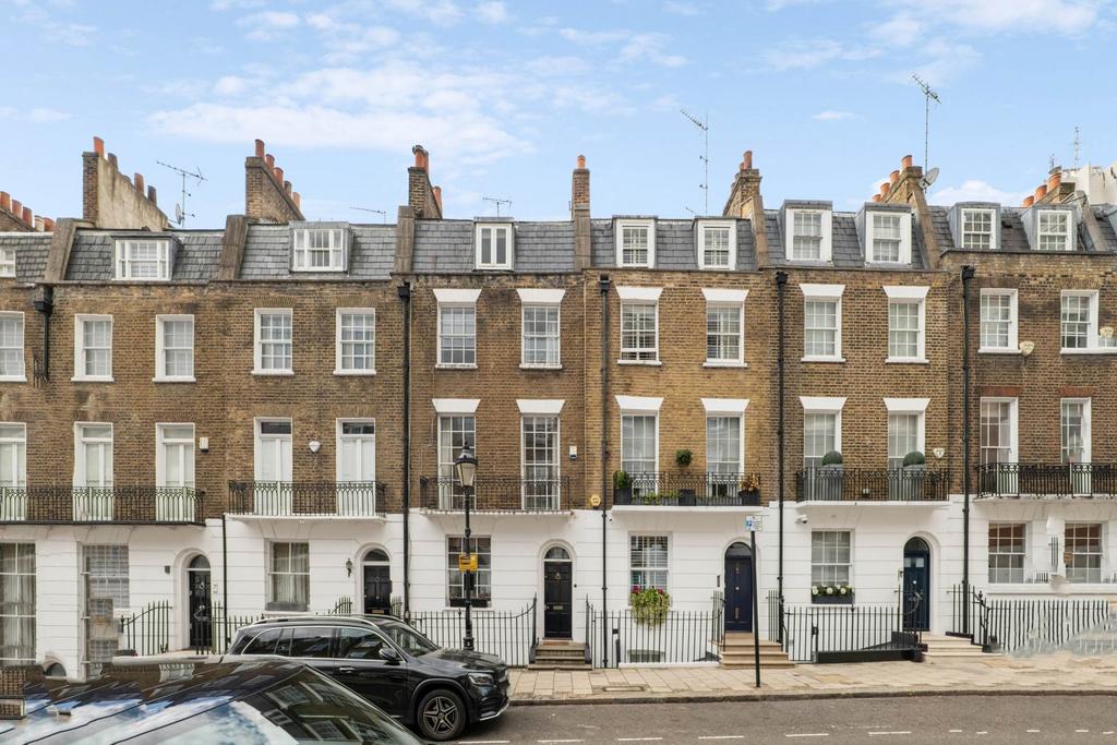 Terraced house exterior, parking