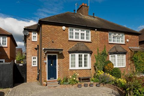 19 Simmil Road, Claygate, Esher, KT10 0RT