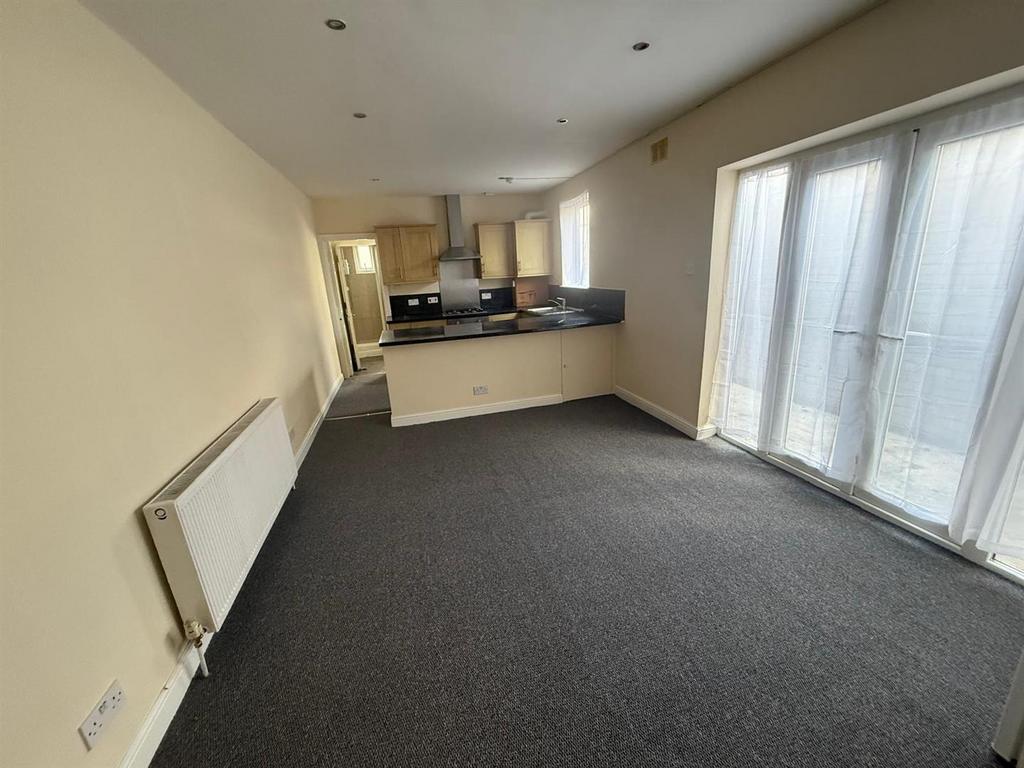 Open plan lounge &amp; kitchen.jpg