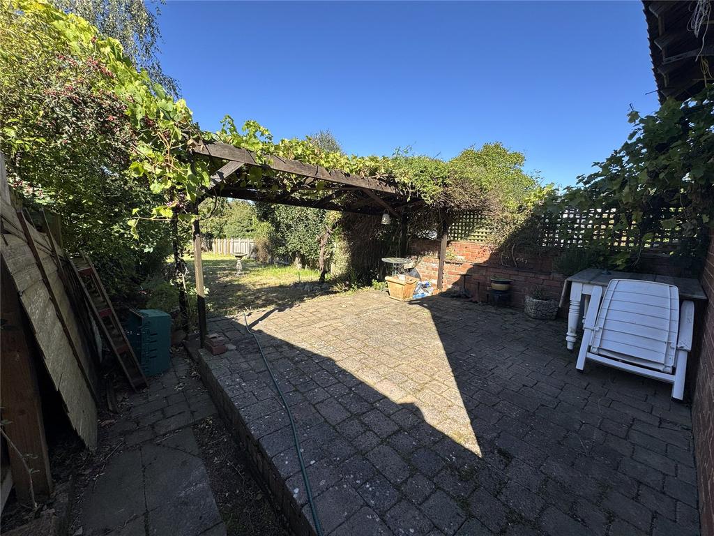 Rear Patio To Lawn