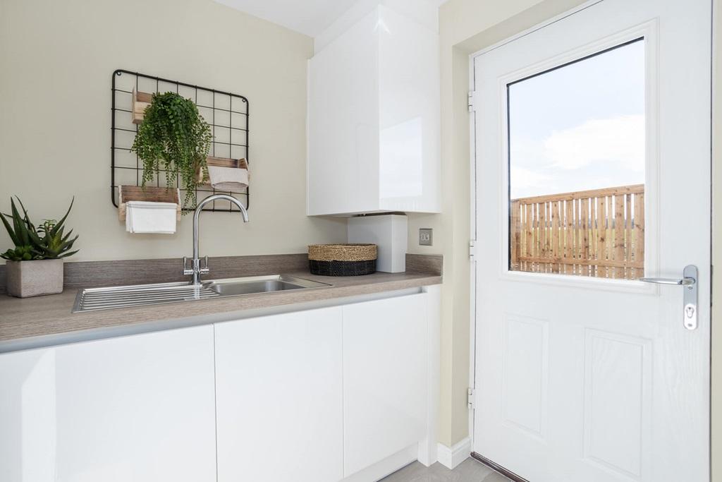The utility room provided extra storage space