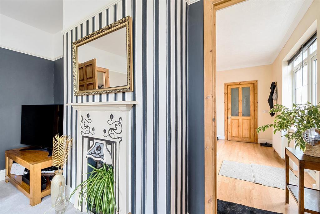 Sitting Room into Entrance Hallway