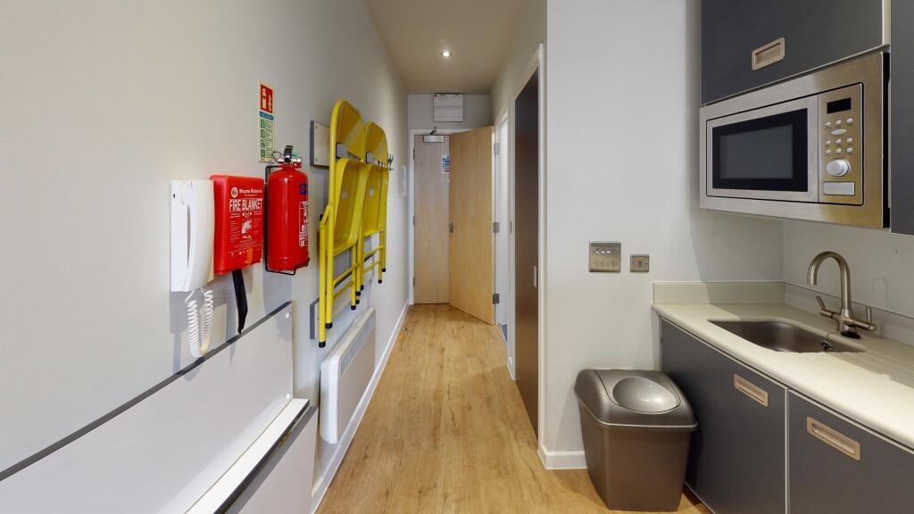 A clean and well-maintained bathroom featuring ...