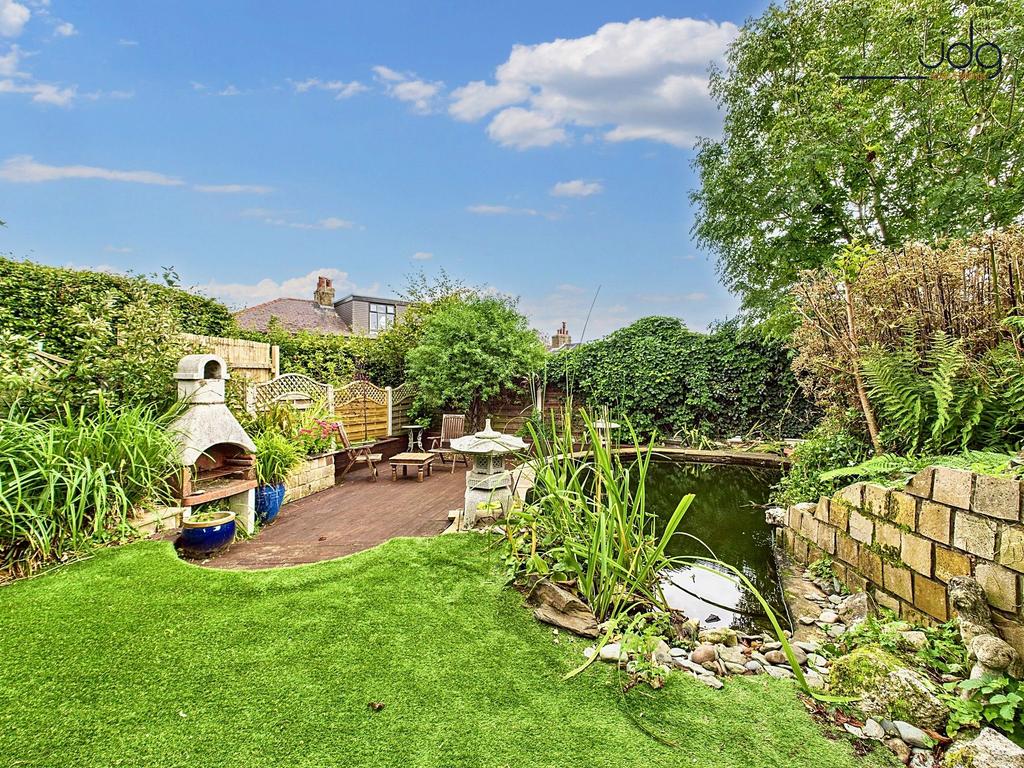 Spacious garden with a mixed of decking,...