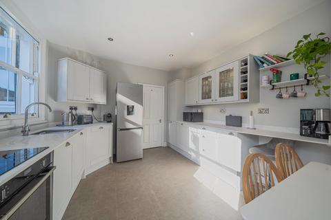 16a Quicks Road, London, SW19 1EZ