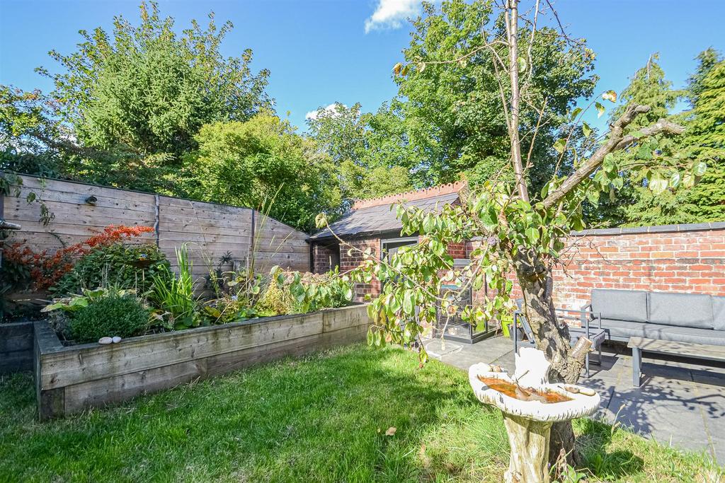 Outbuilding & Raised Borders