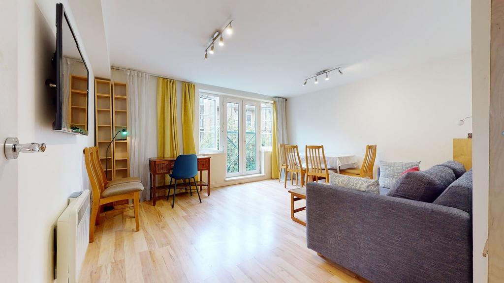 Bright and airy living room bathed in natural l...