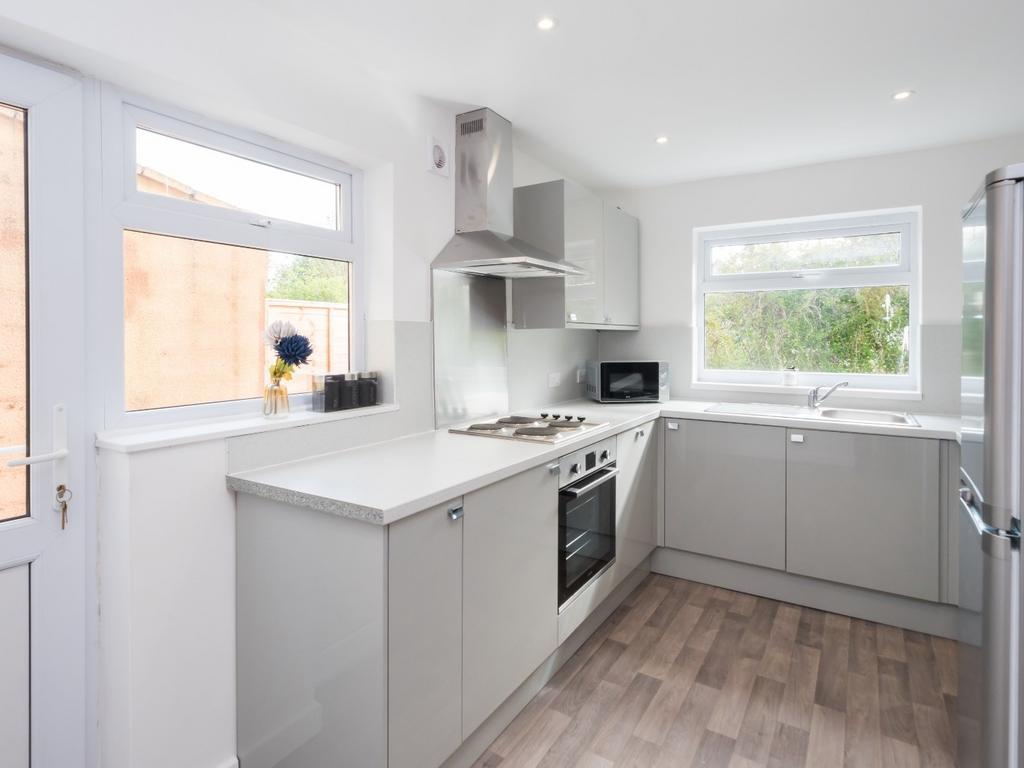 Bright modern kitchen with ample workspace...