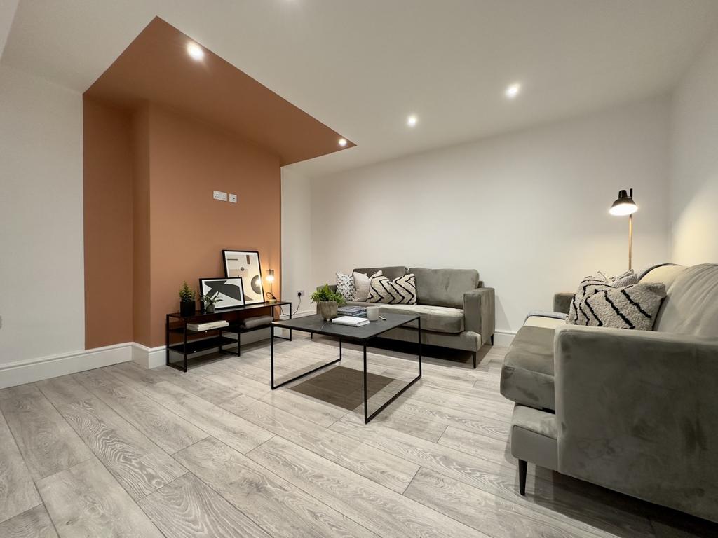 A stylish and spacious modern living room perfe...