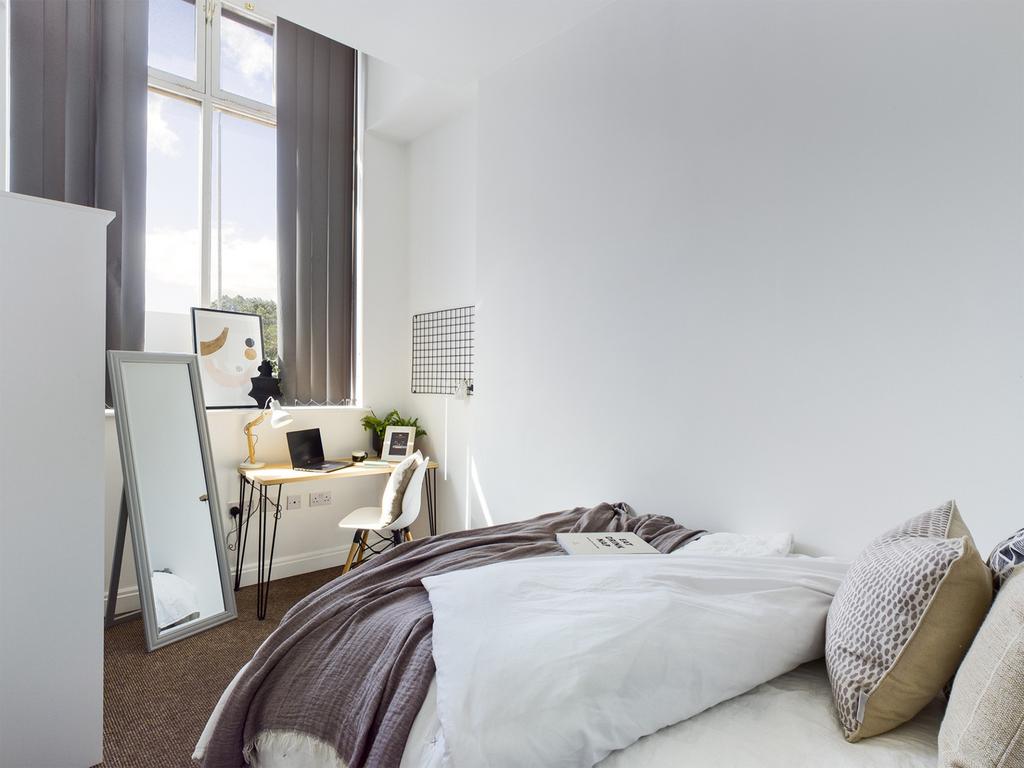 A bright and inviting double bedroom, perfect f...
