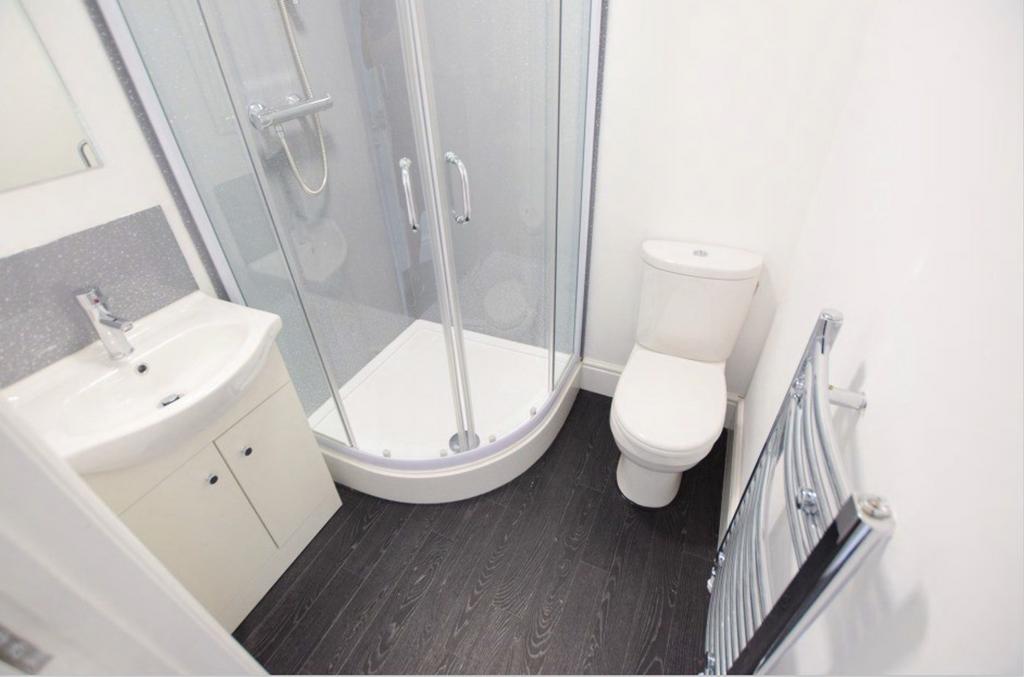 A modern and clean bathroom featuring a stylish...