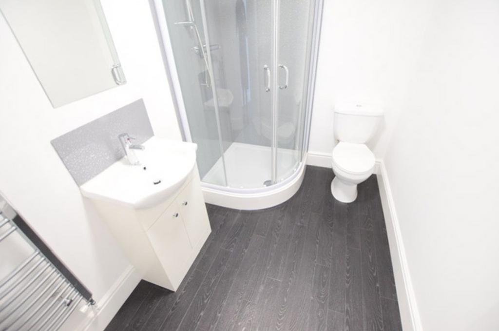 A modern and clean bathroom featuring a stylish...